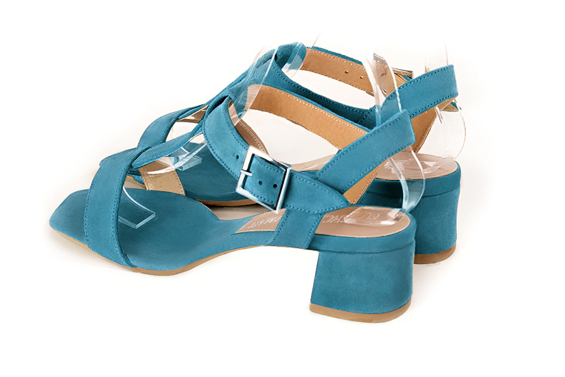 Peacock blue women's fully open sandals, with an instep strap. Square toe. Low flare heels. Rear view - Florence KOOIJMAN